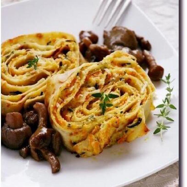 Des crêpes roulées aux champignons et aux courgettes